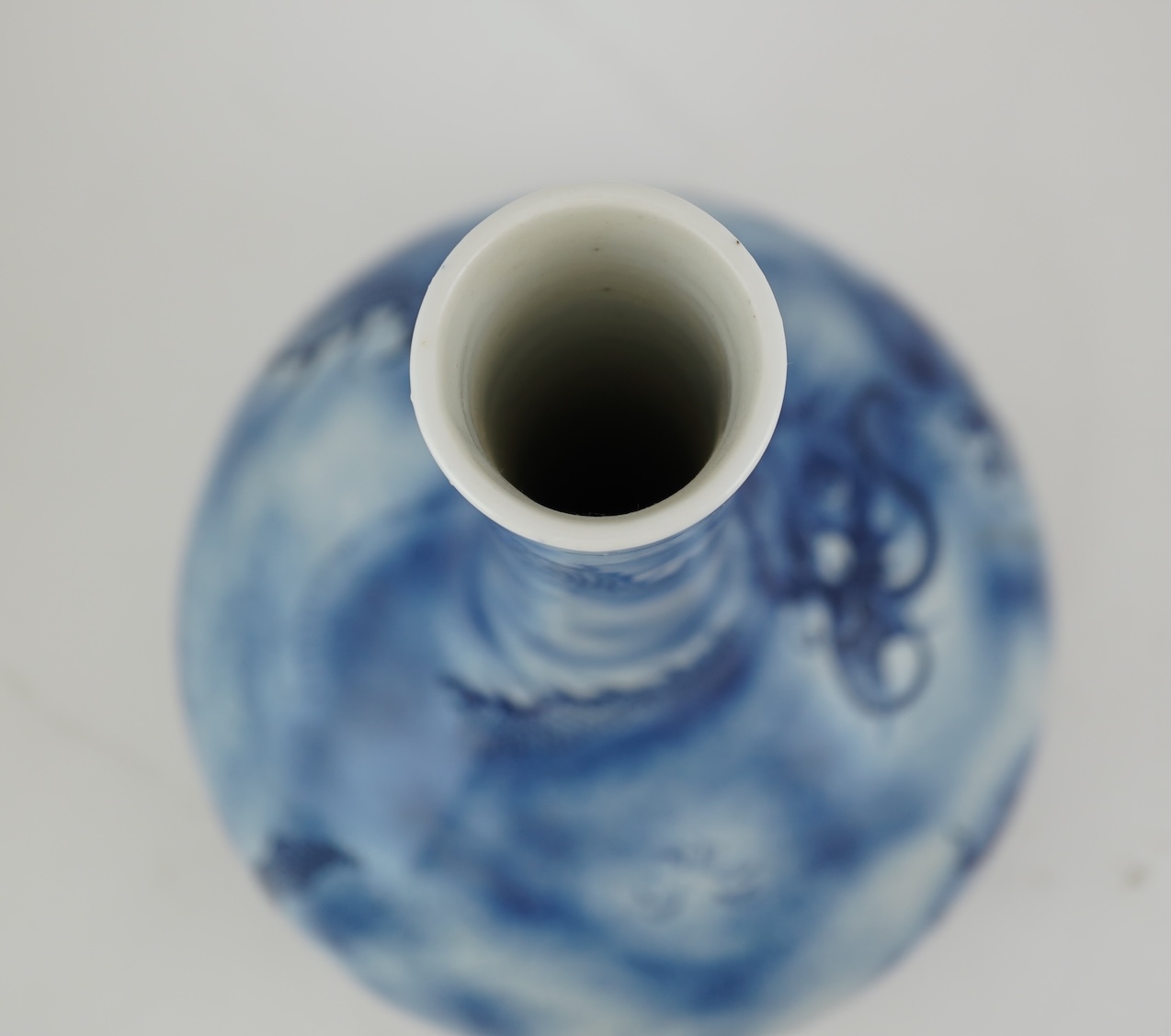 A Chinese blue and white ‘dragon’ bottle vase, 19th century